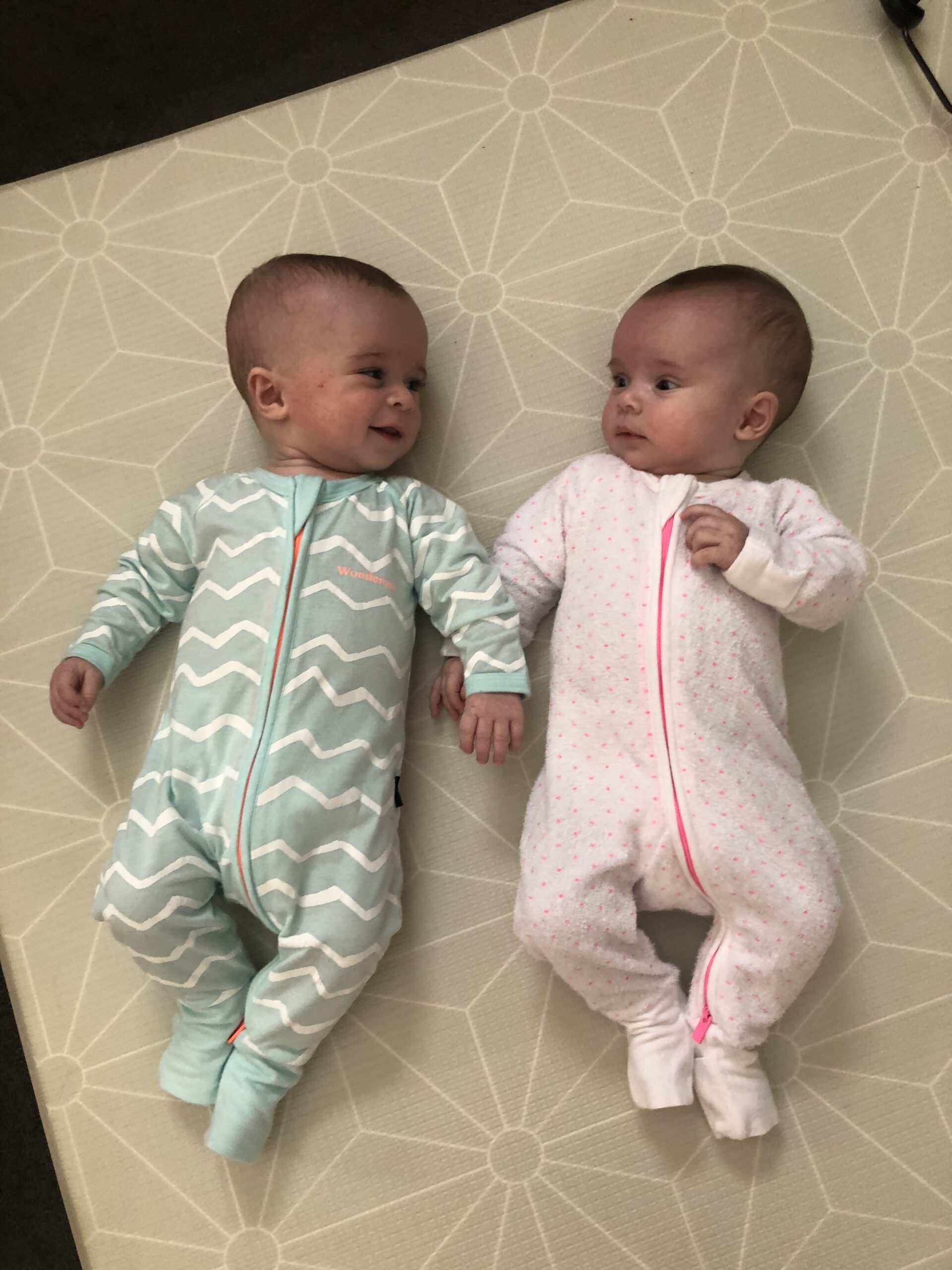 twin babies smiling